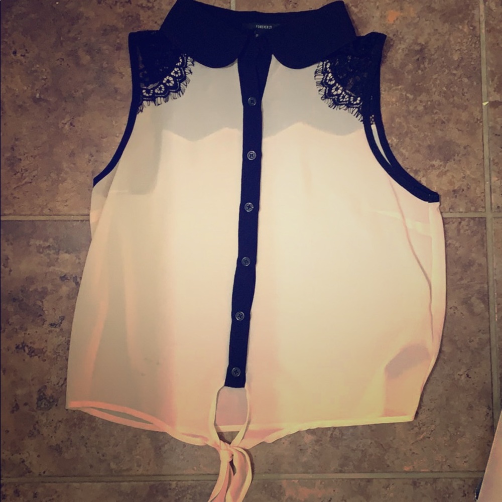 A casual no sleeve button down blouse.